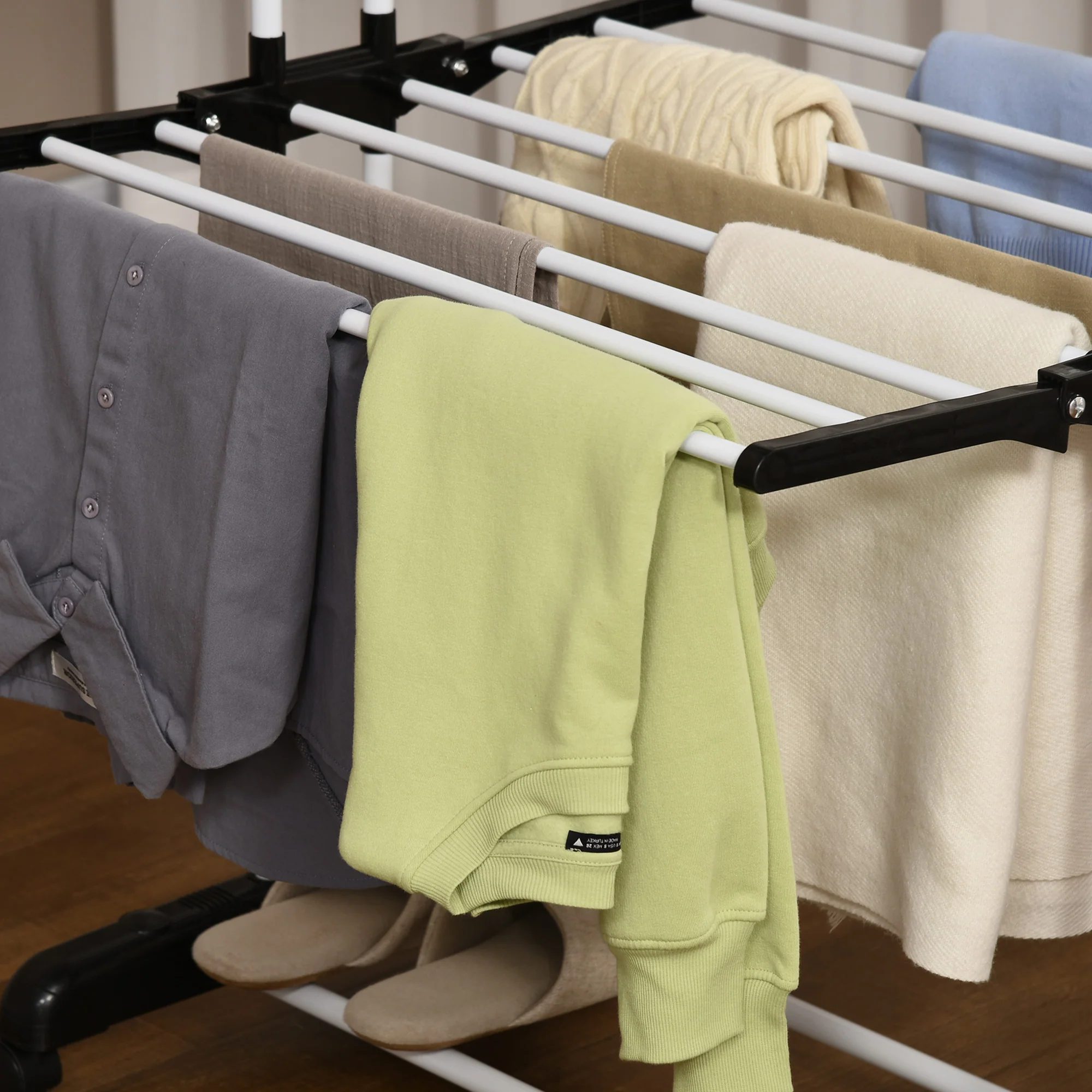 4-Tier Steel Laundry Racks for Drying Clothes with 2 Side Wings and 4 Castors, Black - Image 11